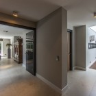 Hall Space Villa Astonishing Hall Space Design Of Villa In The Dunes With Grey Floor Made From Concrete Blocks And Wide Yellow Lighting Dream Homes Cozy And Bright Modern Home Surrounded By Lush Forest Views