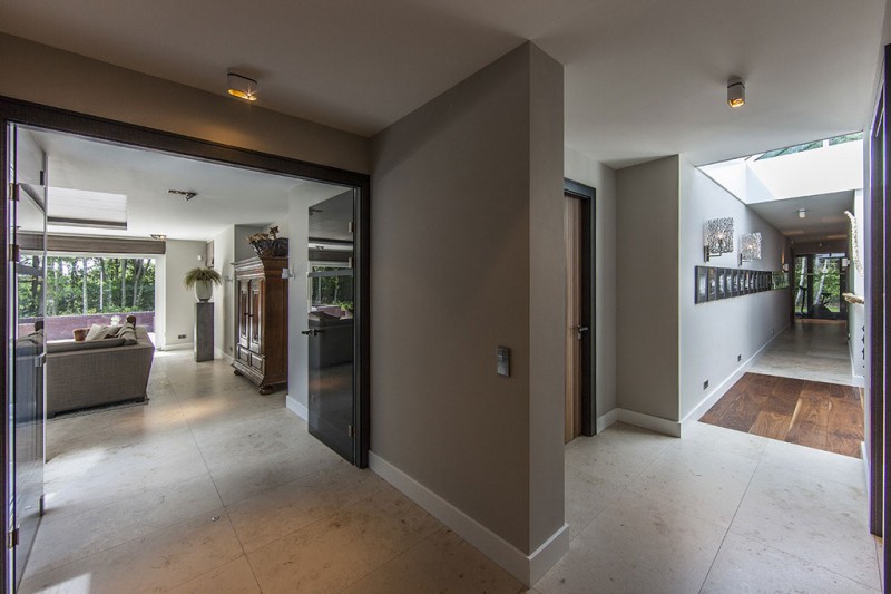 Hall Space Villa Astonishing Hall Space Design Of Villa In The Dunes With Grey Floor Made From Concrete Blocks And Wide Yellow Lighting Dream Homes Cozy And Bright Modern Home Surrounded By Lush Forest Views