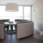 Apartement On Dining Awesome Apartment On The Waterfront Dining Room Furnished With Cool Curved Sofa And Round Dining Table Apartments Scandinavian Interior Design With Minimalist Round Dining Table