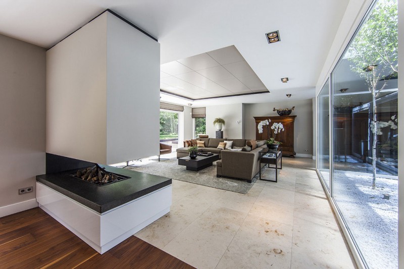 Living Room Villa Breathtaking Living Room Design Of Villa In The Dunes With White Concrete Floor And Square Shaped Window Dream Homes Cozy And Bright Modern Home Surrounded By Lush Forest Views