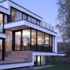 View By In Breathtaking View By Zochental Residence In The Left Side Showing Glass Wall And Door Design With Trees Standing The Front Of House Architecture Creative Glass Facade Of Unconventional Contemporary House Appearance