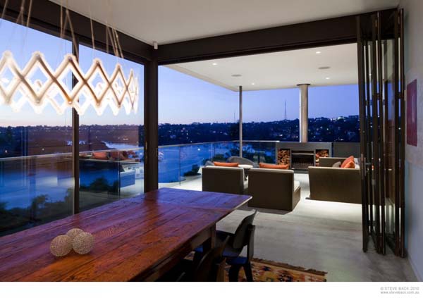 View By And Calm View By Wooden Table And Black Chairs Feat Wide Fur Rug Under Pendant Lamps At The River House Dream Homes  Luxurious And Cozy River House With Rectangle Swimming Pools