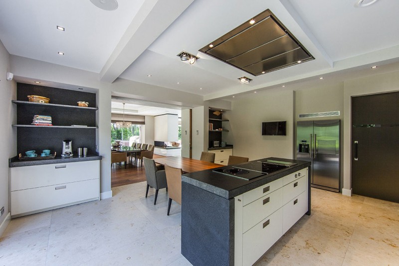 Kitchen Design In Cool Kitchen Design Of Villa In The Dunes With White Colored Kitchen Island Made From Wood With Black Marble Surface Dream Homes  Cozy And Bright Modern Home Surrounded By Lush Forest Views