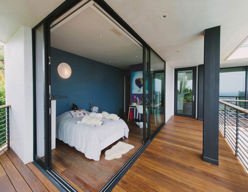 Bedroom With Door Cozy Bedroom With Sliding Glass Door White Bed Rustic Wood Floor Scenic Painting Small Balcony With Metallic Railing In Green Greenberg Green House Architecture  Curvy Futuristic Home Presenting Futuristic Gray And White Themes