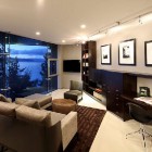 Cliff House Dziewulski Cozy Cliff House By Mark Dziewulski Architect With Glamorous TV Room Interior With Framed Wall Arts Above Workspace Architecture Waterfront Cliff House With Luxurious Furniture And Beautiful View