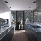 View By Design Distinct View By Kitchen Room Design With Glass Wall And Door That Showing Outside View By Planters At The Zochental Residence Architecture Creative Glass Facade Of Unconventional Contemporary House Appearance