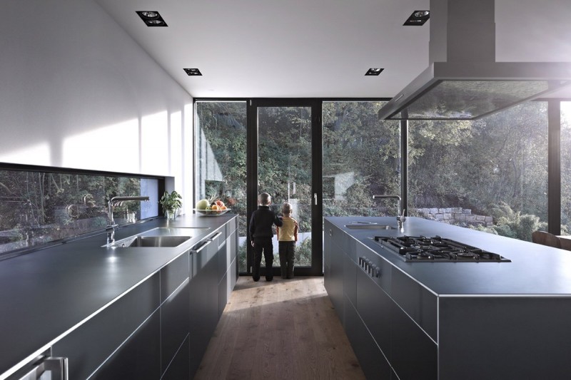 View By Design Distinct View By Kitchen Room Design With Glass Wall And Door That Showing Outside View By Planters At The Zochental Residence Architecture Creative Glass Facade Of Unconventional Contemporary House Appearance