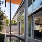 Double Height Inground Exciting Double Height Graham Home In Ground Swimming Pool Idea With Orange Cantilever And Surrounded By Greenery Dream Homes Creative Contemporary Home For Elegant And Unusual Cantilevered Appearance