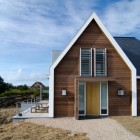 Catching Wooden In Eye Catching Wooden Holiday Home In Vlieland Entrance Idea Designed With L Shaped Cantilever Covering Door Dream Homes Classic Home Exterior Hiding Stylish Interior Decorations