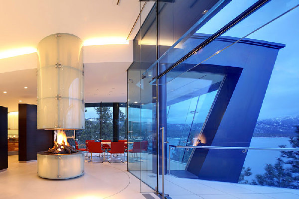 Round Fireplace To Fascinating Round Fireplace Idea Installed To Warm Up Cliff House By Mark Dziewulski Architect With Extraordinary Glass Wall Architecture Waterfront Cliff House With Luxurious Furniture And Beautiful View