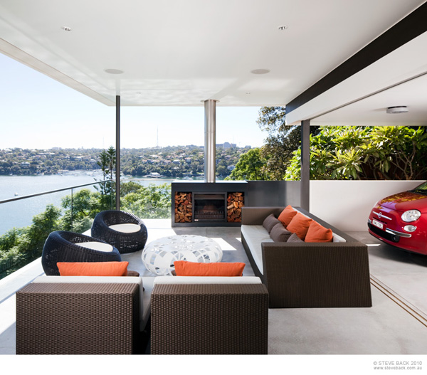 Open Living Nice Fresh Open Living Room With Nice Sofas Feat Orange And Brown Pillows Facing White Table At The River House Dream Homes Luxurious And Cozy River House With Rectangle Swimming Pools