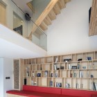 Vi Sang Displaying Gorgeous Vi Sang House Interior Displaying Built In Wall Wooden Bookcase Featured With Red Bench For Seating Architecture Mesmerizing Glass Contemporary Home With Striking Unique Exteriors