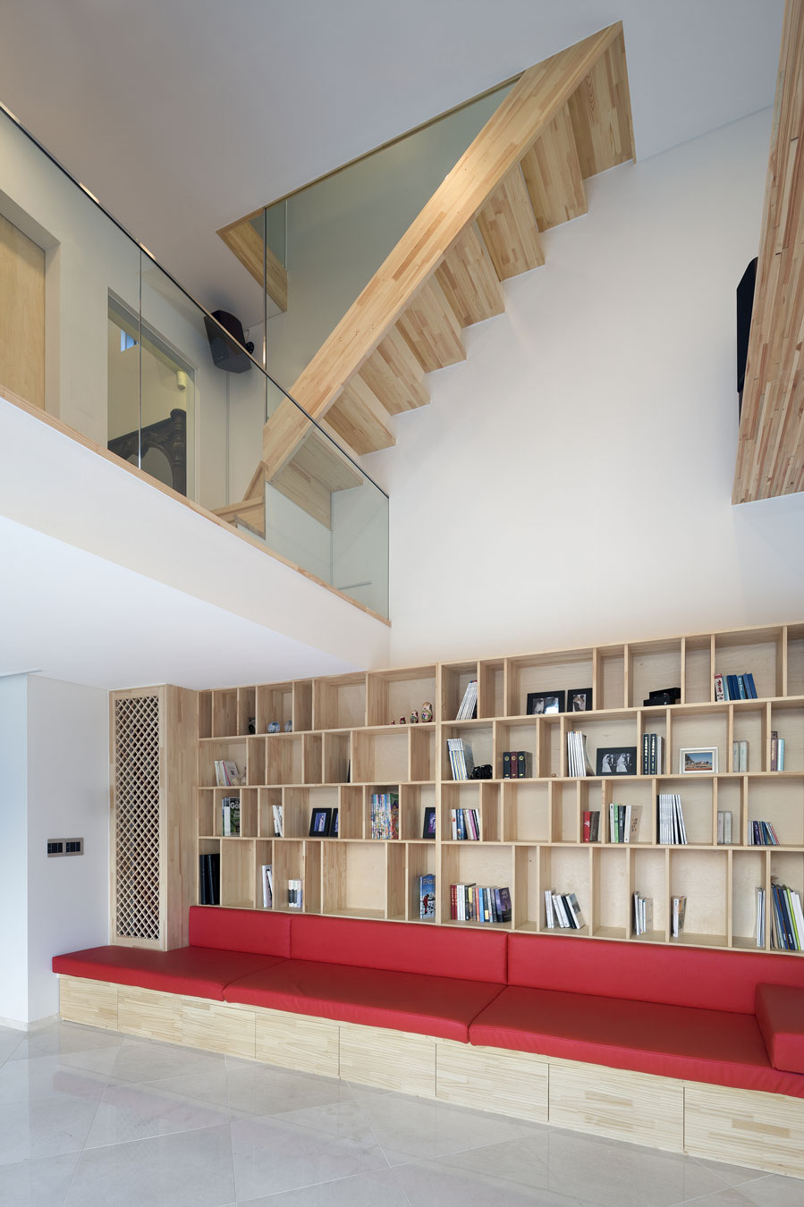 Vi Sang Displaying Gorgeous Vi Sang House Interior Displaying Built In Wall Wooden Bookcase Featured With Red Bench For Seating Architecture  Mesmerizing Glass Contemporary Home With Striking Unique Exteriors