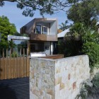 Balmain Residence Roof Iconic Balmain Residence With Asymmetric Roof And Wall Design Small Balcony Rough Stone Garden Wall Ornamental Plants Architecture New Contemporary Home With Modern Interior And Traditional Exterior Elements