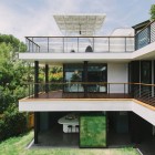 Green Greenberg Small Iconic Green Greenberg Green House Small Balcony With Tough Metallic Railing Open Plan Interior White Canopy Wide Grassy Courtyard Architecture Curvy Futuristic Home Presenting Futuristic Gray And White Themes (+12 New Images)