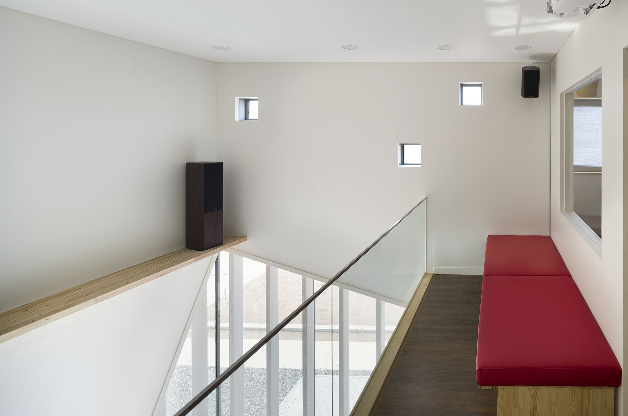 Red Bench Vi Interesting Red Bench Placed On Vi Sang House Upper Floor Entryway With Small Modular Windows And Balustrade Architecture  Mesmerizing Glass Contemporary Home With Striking Unique Exteriors