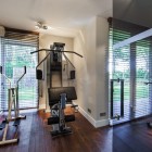 Gym Room Villa Mesmerizing Gym Room Design Of Villa In The Dunes With Dark Brown Wooden Floor And Several Metallic Gym Equipment Dream Homes Cozy And Bright Modern Home Surrounded By Lush Forest Views