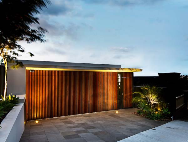 Warringah Road Yard Minimalist Warringah Road House Front Yard Area Showing Eye Catching Wooden Garage Door And Hardscape Dream Homes Spacious Contemporary Three Story House With Elegant Panorama View