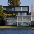 White And Graham Modern White And Black Painted Graham House Building Seen From Water Site Displaying Green Manicured Turfs Dream Homes Creative Contemporary Home For Elegant And Unusual Cantilevered Appearance