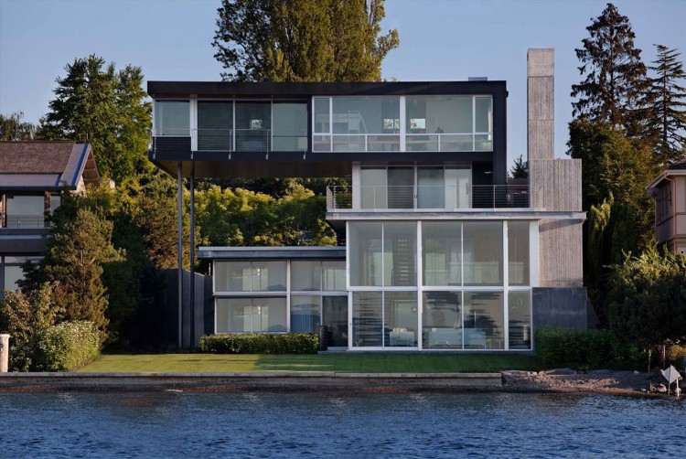 White And Graham Modern White And Black Painted Graham House Building Seen From Water Site Displaying Green Manicured Turfs Dream Homes Creative Contemporary Home For Elegant And Unusual Cantilevered Appearance