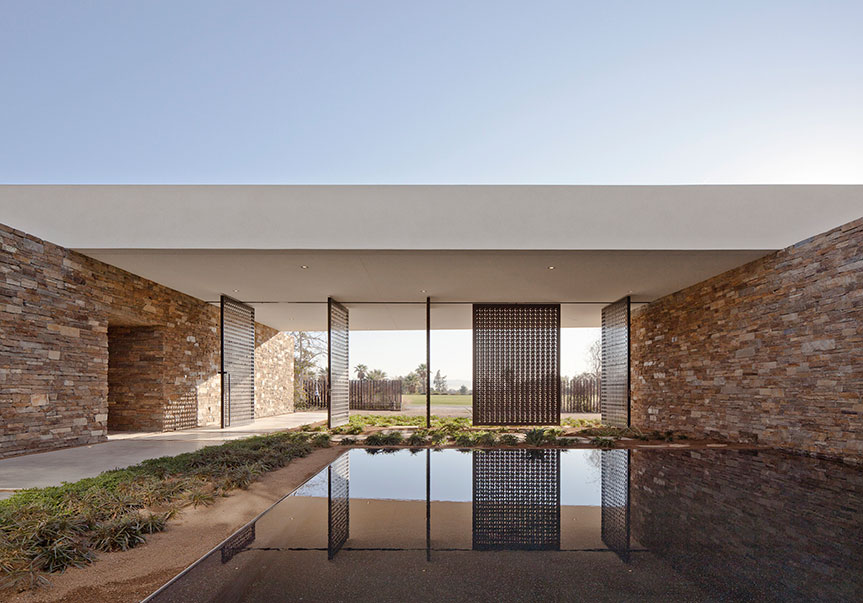 Stone Wall Metallic Natural Stone Wall Ornamental Pool Metallic Swing Door Wide Grassy Courtyard Madison House With Concrete Floor Dream Homes Spectacular And Spacious Contemporary House With Sliding Glass Walls