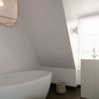 White Themed In Small White Themed Holiday Home In Vlieland Master Bathroom In Attic Area Illuminated By Classic Pendant Dream Homes Classic Home Exterior Hiding Stylish Interior Decorations