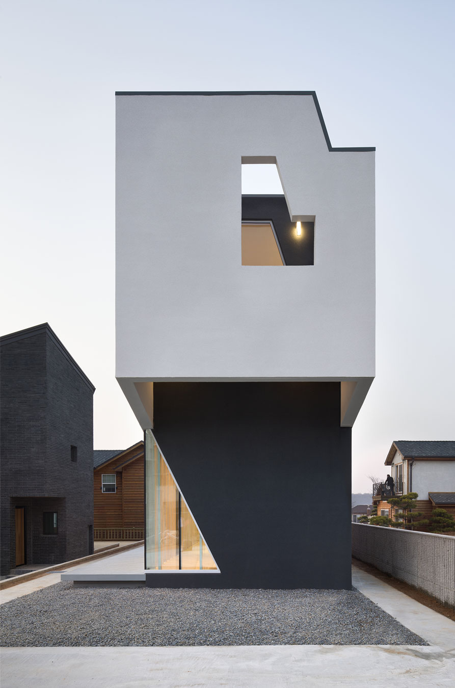 Black Painted House Stunning Black Painted Vi Sang House Combined With Clear White Splash Covering The Upper Floor Level Idea Architecture Mesmerizing Glass Contemporary Home With Striking Unique Exteriors