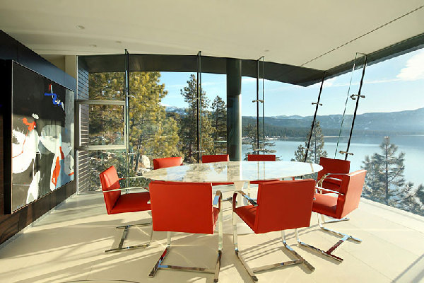 Red Colored Oval Surprising Red Colored Chairs Surrounding Oval Table In Cliff House By Mark Dziewulski Architect With Amazing Dining Room Decoration Waterfront Cliff House With Luxurious Furniture And Beautiful View