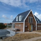Two Floor In Traditional Two Floor Holiday Home In Vlieland Architecture Involving Attic Roof And Open Balcony For Gathering Dream Homes Classic Home Exterior Hiding Stylish Interior Decorations