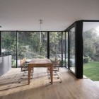 View By Design Warm View By Kitchen Table Design With Wooden Table And Chairs Under The Pendant Lamps At The Zochental Residence Architecture Creative Glass Facade Of Unconventional Contemporary House Appearance