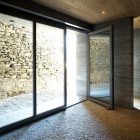 Barn In Entrance Bright Barn In Soglio Home Entrance Area Involving Glass Framed Swinging Doors To Access Exterior Area Of Home Decoration An Old Barn Turned Into Eclectic Contemporary House With Stone Walls And Wood Shutters