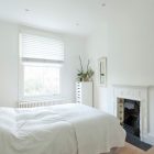 White Bed Cabinet Comfortable White Bed And Small Cabinet Flower Wall Mural Fake Flower Antique Fireplace In A Crisp White Home Apartments Luminous And White Scandinavian Home With Exposed Eclectic Brick Facade