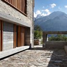 Barn In Courtyard Fascinating Barn In Soglio Home Courtyard Area Enhanced With Stone Cladding Covering The Floor And Wall Decoration An Old Barn Turned Into Eclectic Contemporary House With Stone Walls And Wood Shutters