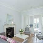 Floor Lamp Table Glossy Floor Lamp White Coffee Table And Cushy Sofa With Striped Pillows In Chic A Crisp White Home Classic Fireplace Apartments Luminous And White Scandinavian Home With Exposed Eclectic Brick Facade