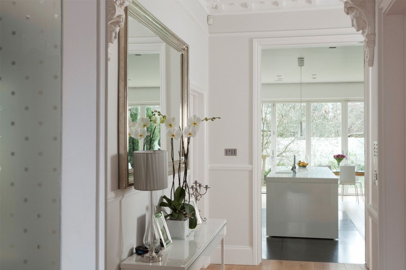 Flowers On Compact Precious Flowers On White Sideboard Compact White Kitchen Island Square Mirror In Silver Frame Glass Door Apartments  Luminous And White Scandinavian Home With Exposed Eclectic Brick Facade