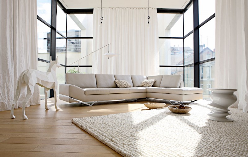 White Colored Sofa Artistic White Colored Roche Bobois Sofa Set Arranged Diagonally With Cool Sculptural Dog Located Next To It Interior Design  38 Contemporary Living Room With Modern Sofas Designed By Roche Bobois