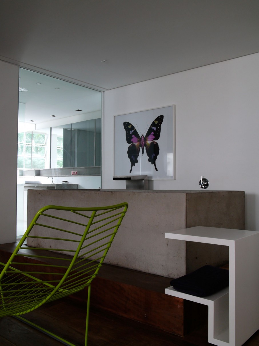 Rectangular Concrete White Astounding Rectangular Concrete Tub With White Shelving For Towel Display Completed With Accent Green Seating Unit For Bathroom Furnishing Apartments Fascinating Modern-Industrial Apartment With Beautiful Sophisticated Accent