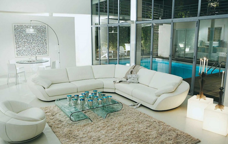 White Quilted Sofa Contemporary White Quilted Roche Bobois Sofa Set With Incredible Blue Glass Coffee Table Decorated By Crystal Items On It Interior Design 38 Contemporary Living Room With Modern Sofas Designed By Roche Bobois