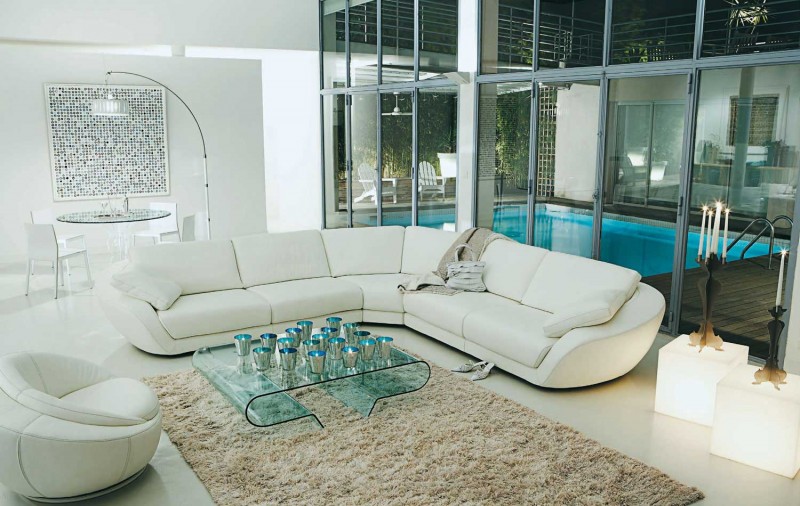 White Quilted Sofa Contemporary White Quilted Roche Bobois Sofa Set With Incredible Blue Glass Coffee Table Decorated By Crystal Items On It Interior Design  38 Contemporary Living Room With Modern Sofas Designed By Roche Bobois