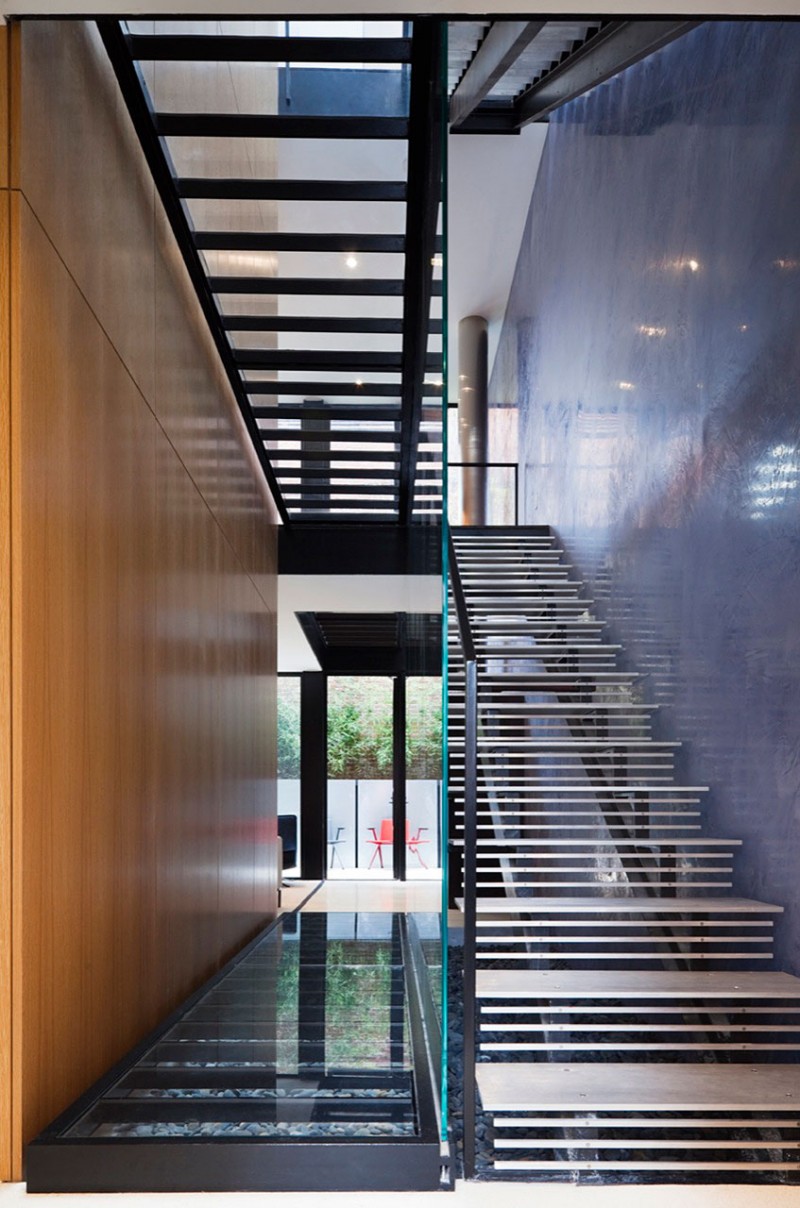 Lorber Tarler Staircase Enchanting Lorber Tarler House Geometric Staircase With Glass Railing High Gloss Finish Wood Wall Sleek Concrete Wall Shiny Ceiling Lights Dream Homes  Old House Turned Into A Stylish Modern Residence For Urban Dwelling