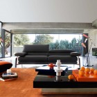 Catching Beautiful Black Eye Catching Beautiful Interior Decorated Black Quilted Roche Bobois Sofa Set Coupled With Strong Orange Chair And Coffee Table To Energize The Room Interior Design 38 Contemporary Living Room With Modern Sofas Designed By Roche Bobois