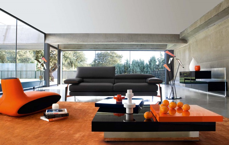 Catching Beautiful Black Eye Catching Beautiful Interior Decorated Black Quilted Roche Bobois Sofa Set Coupled With Strong Orange Chair And Coffee Table To Energize The Room Interior Design  38 Contemporary Living Room With Modern Sofas Designed By Roche Bobois