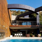 Cattching Curving Above Eye Catching Curving Frame Built Above Upper Floor Balcony Of House The In The Backyard Area With Pool Dream Homes Eclectic Contemporary Home In Hip And Vibrant Interior Style