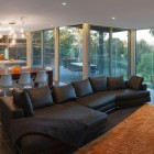 Catching Orange Placed Eye Catching Orange Patterned Rug Placed On Center Of Maribyrnong House Family Room With Large Sofa Bed Architecture Lavish And Breathtaking Contemporary Home With Spectacular Exterior Appearance