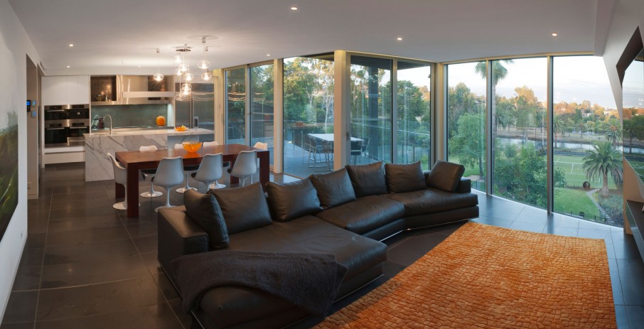 Catching Orange Placed Eye Catching Orange Patterned Rug Placed On Center Of Maribyrnong House Family Room With Large Sofa Bed Architecture Lavish And Breathtaking Contemporary Home With Spectacular Exterior Appearance
