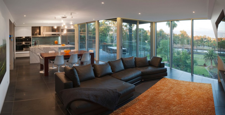 Catching Orange Placed Eye Catching Orange Patterned Rug Placed On Center Of Maribyrnong House Family Room With Large Sofa Bed Architecture  Lavish And Breathtaking Contemporary Home With Spectacular Exterior Appearance