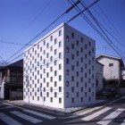 Brick Cell Idea Fascinating Brick Cell House Design Idea Right Beside The Junction Applied Unusual Design Architecture With Holes In The Wall Architecture Unique Contemporary Home In Modern Cube Shape Architecture