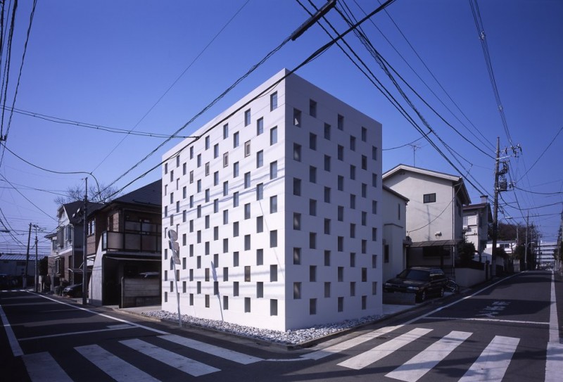 Brick Cell Idea Fascinating Brick Cell House Design Idea Right Beside The Junction Applied Unusual Design Architecture With Holes In The Wall Architecture  Unique Contemporary Home In Modern Cube Shape Architecture