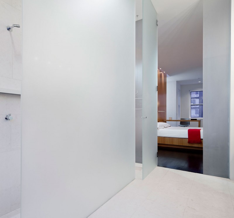 White Themed Frosted Lavish White Themed Bathroom With Frosted Glass Door In Lorber Tarler House Stainless Steel Shower Wood Bed Divan Dream Homes Old House Turned Into A Stylish Modern Residence For Urban Dwelling