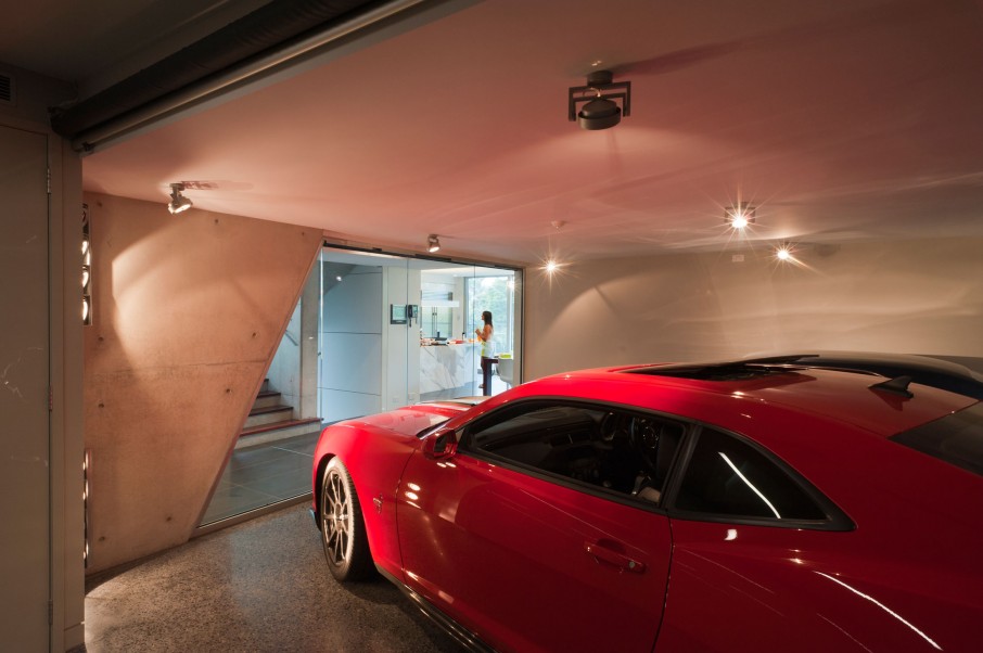 Underground Garage Transparent Minimalist Underground Garage Interior With Transparent Glass Entrance Showing Staircase And Kitchen Of Maribyrnong House Architecture Lavish And Breathtaking Contemporary Home With Spectacular Exterior Appearance